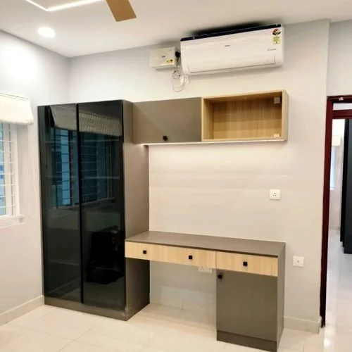Contemporary glass crockery unit with study table